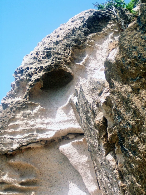 a climb up to the top of a very high cliff