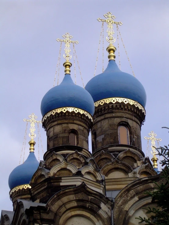 an image of two blue domes on top of a building