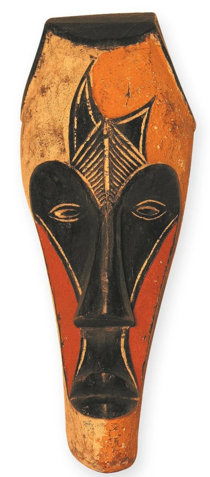 an african mask on a brown background