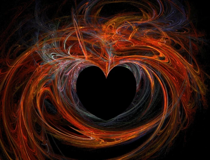 a dark background with an orange and black heart shape