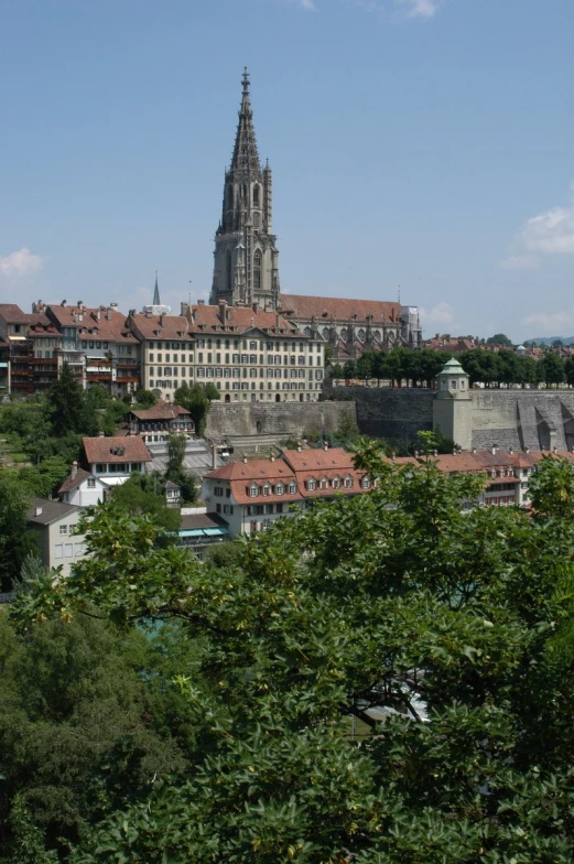 a large building with a very steeple in the middle