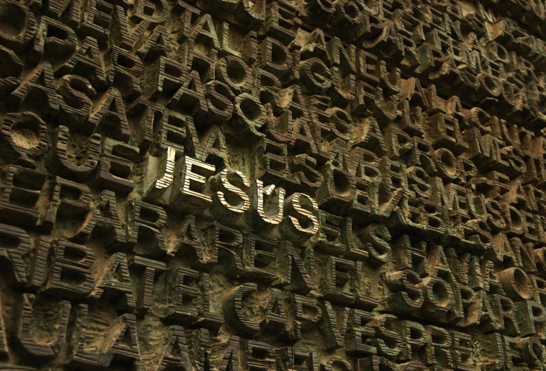 a sign that says jesus made out of letters