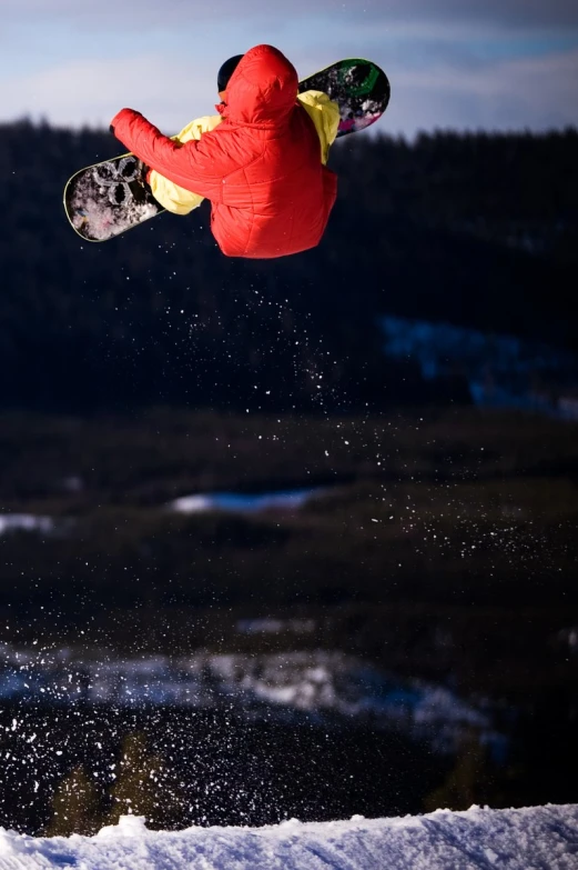 a snowboarder in the air during a jump
