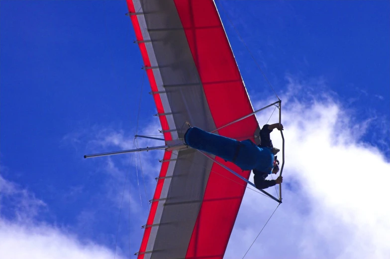 an airplane with a flag and its wing sticking out