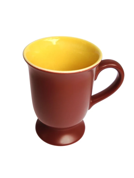 a yellow coffee mug with an burgundy base