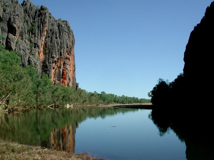 a view of a river near mountains in australia