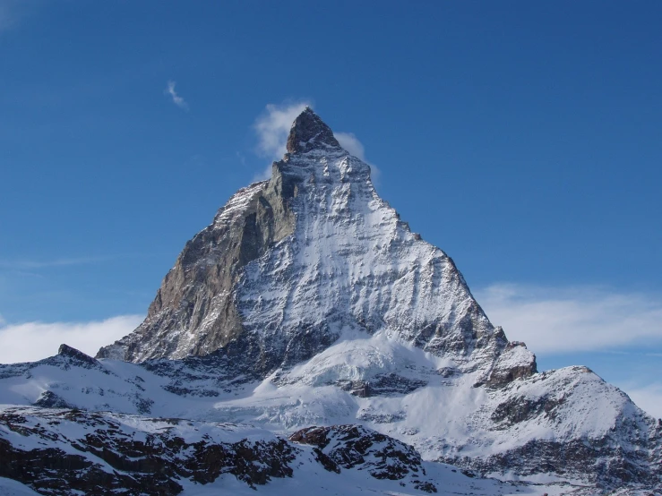 the matter mountain towering over the snow covered mountains