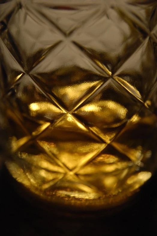 a close up view of a glass on a table