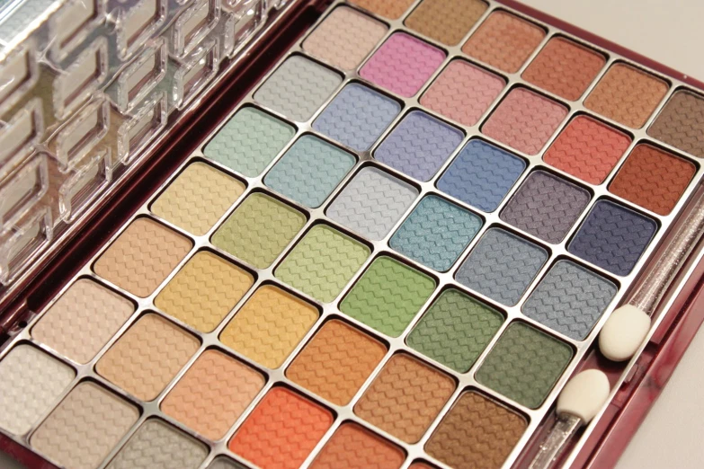 the inside of a large open makeup palette