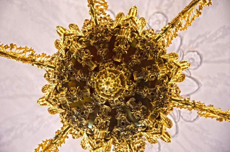 a view looking down at some gold colored objects