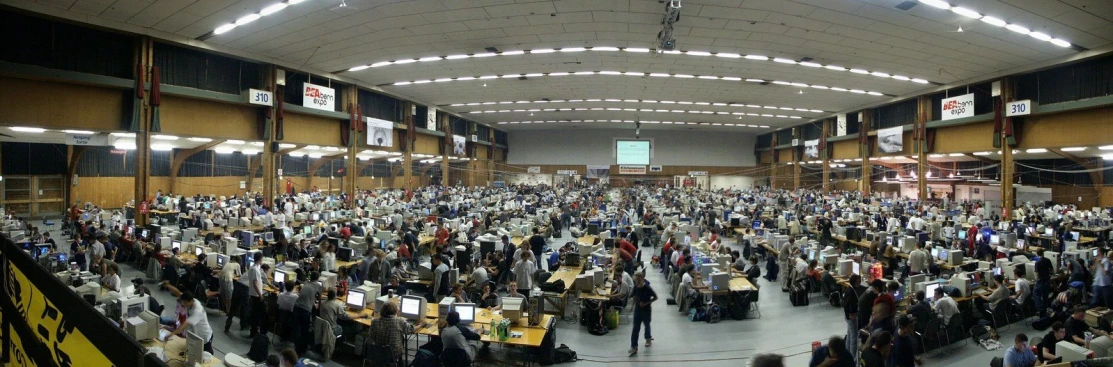 a large group of people in an indoor facility