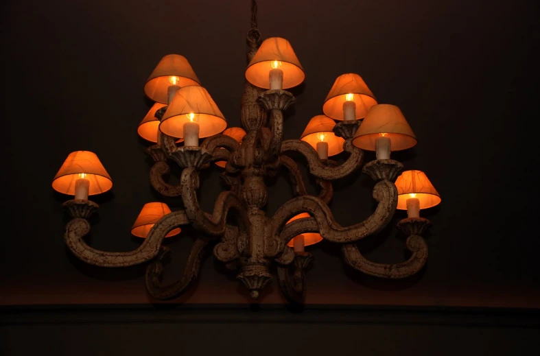 this chandelier has seven lamps on it
