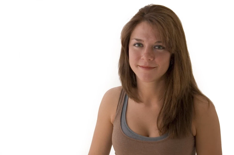 a beautiful young woman posing in a shirt