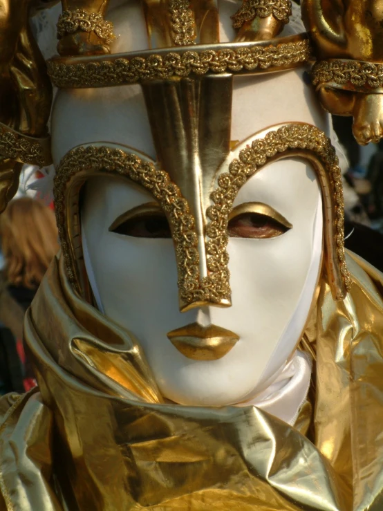 a woman in a costume that looks like a mask