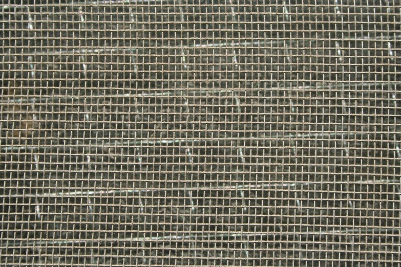 a close up view of an empty grating textured cloth