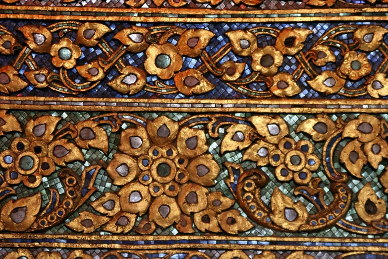 a wooden panel with different patterns and designs