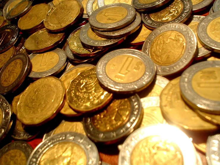 the coin of various varieties sits on a counter top