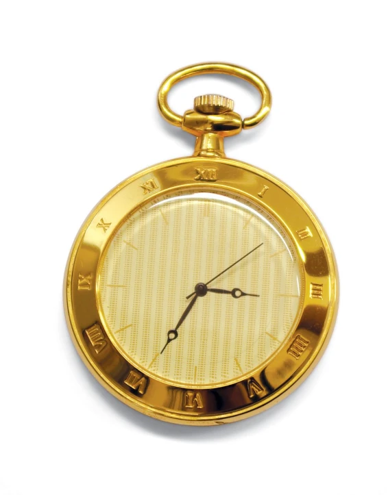 a golden pocket watch sits empty on a white background