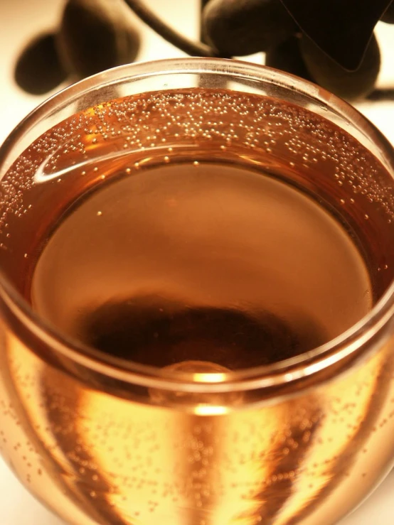 a glass of wine is shown on the table