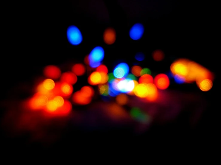blurred image of blurred images with lights in the dark