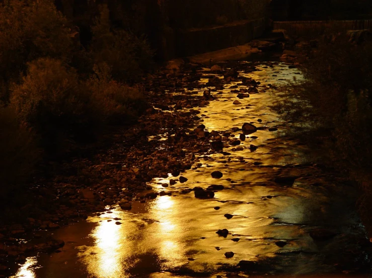 a river that has a lot of rocks in it