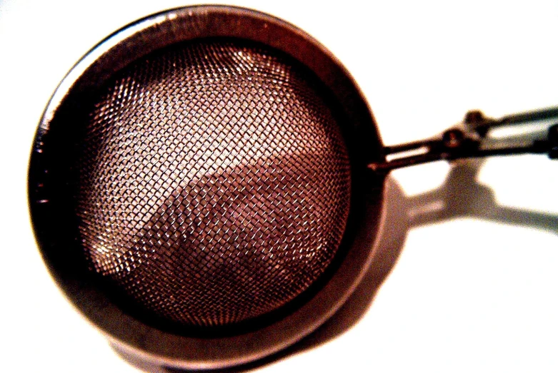 this is an image of a metal mesh strainer