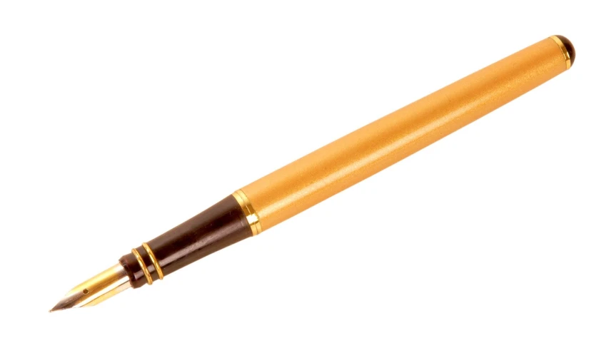 a golden colored pen with a brown cap on it