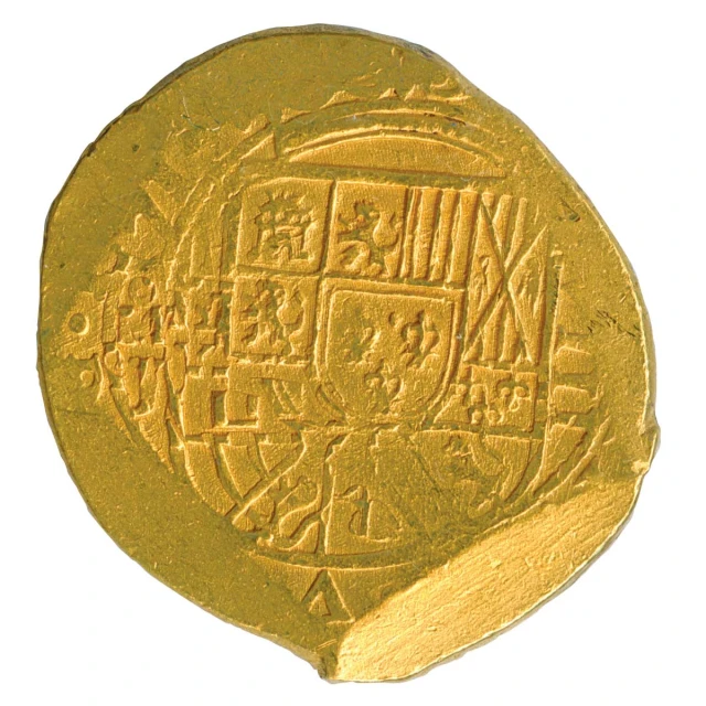 an ancient coin is shown with writing on it