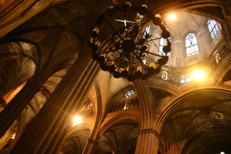 a large ornate ceiling and chandelier with clocks