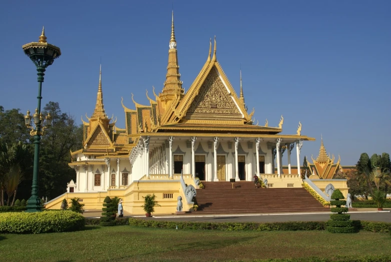 the view of a temple that is located on a sunny day