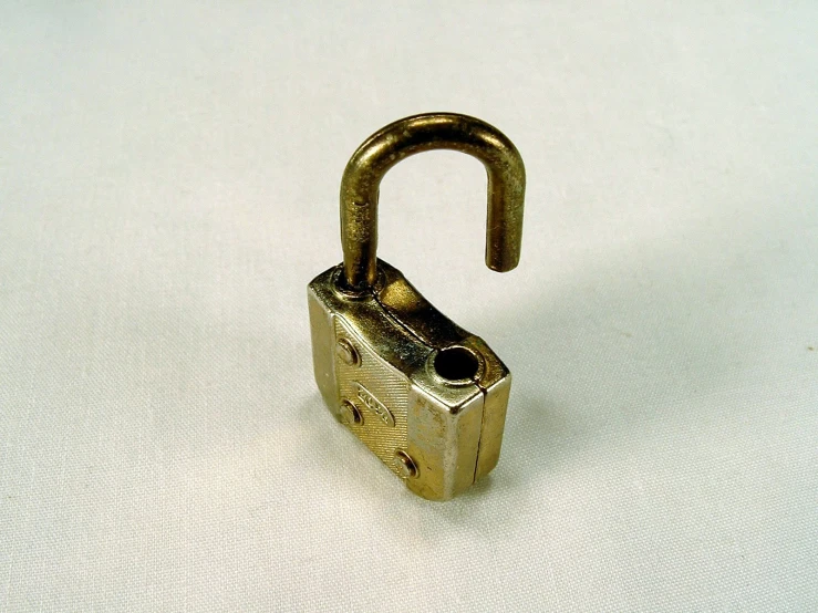 a tiny padlock with an open end