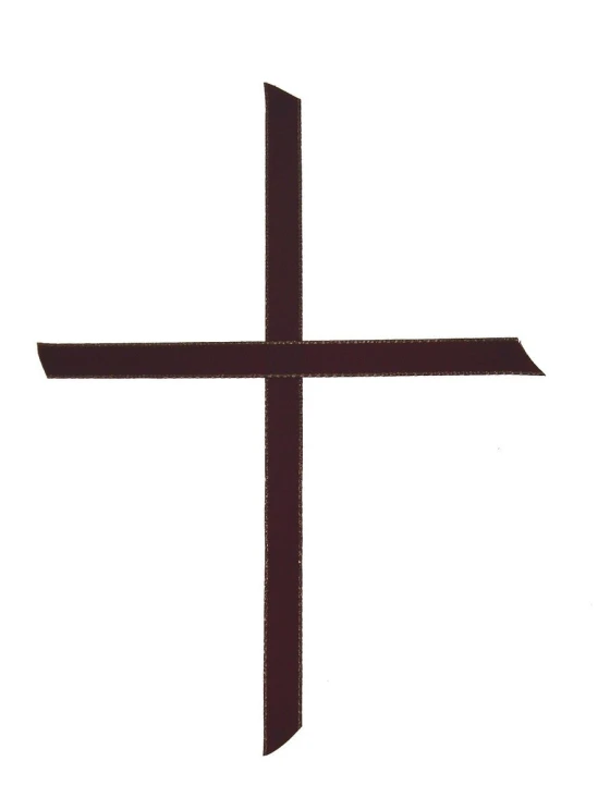 a cross is shown in a dark brown color