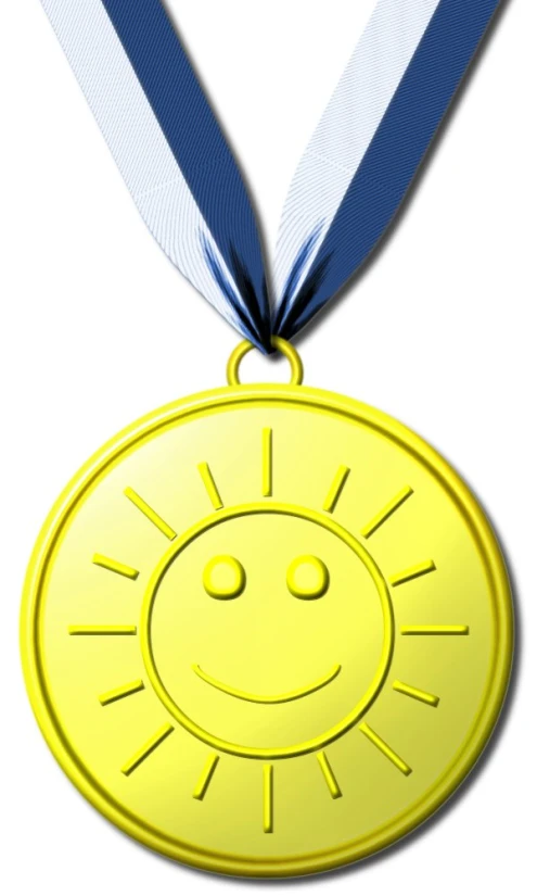 an award medal that has been decorated with a smiley face