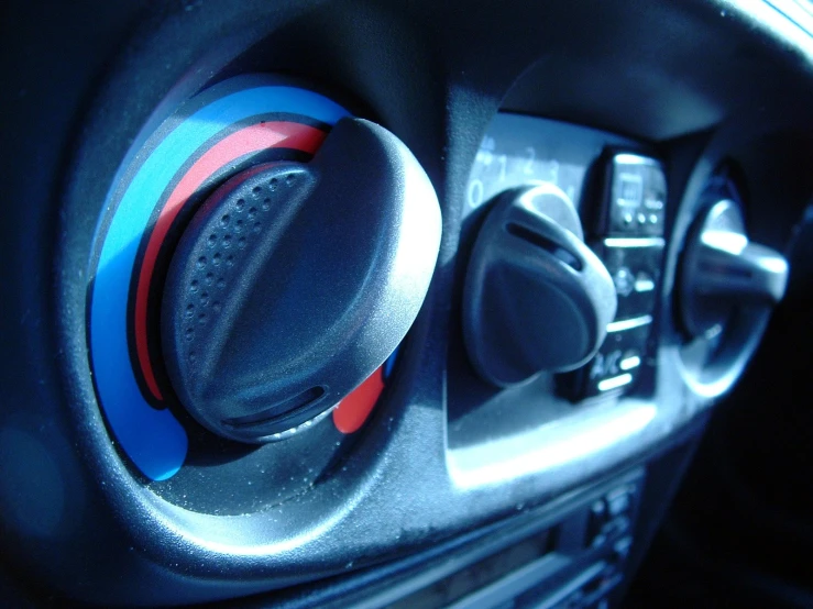 a car stereo has various colored ons in it