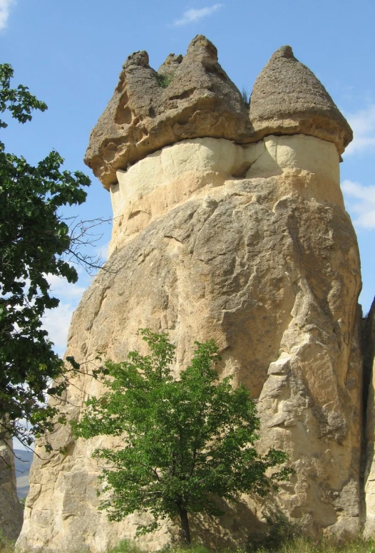 some kind of strange rock formation that looks like a house