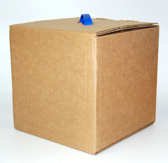 an untidy box sitting on a plain white background