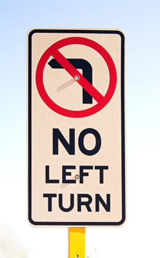 this is an image of no left turn signs