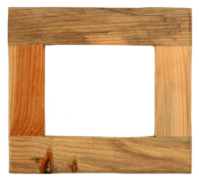 an empty picture frame on a white surface