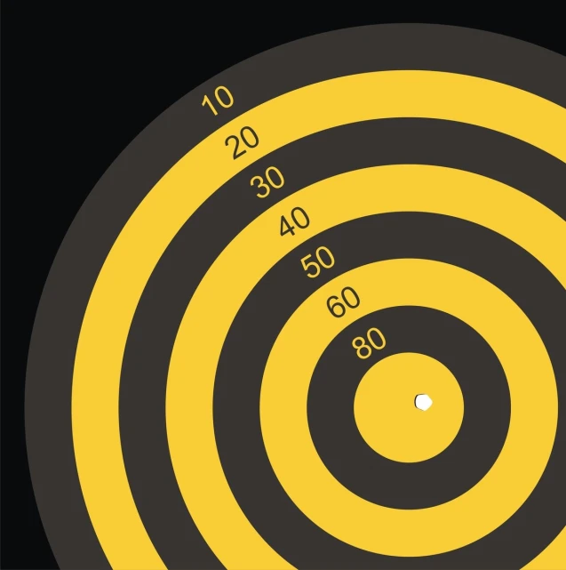 a black and yellow target with five rounds in it