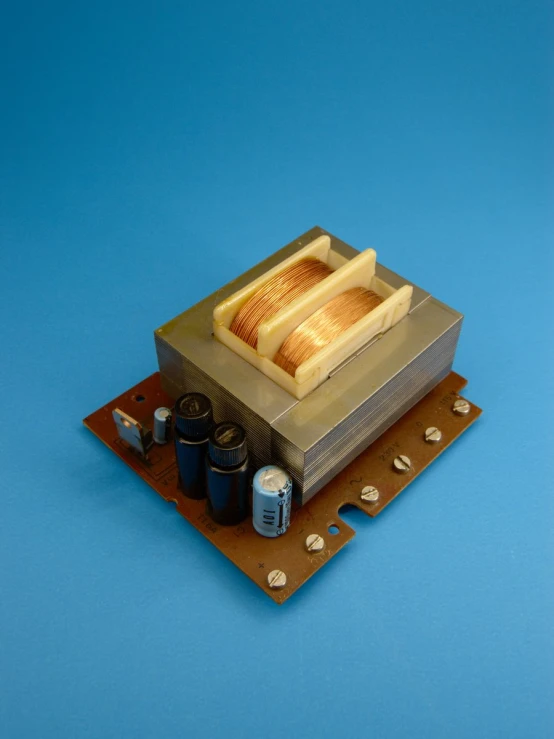 a computer cpu sitting on top of a piece of brown paper