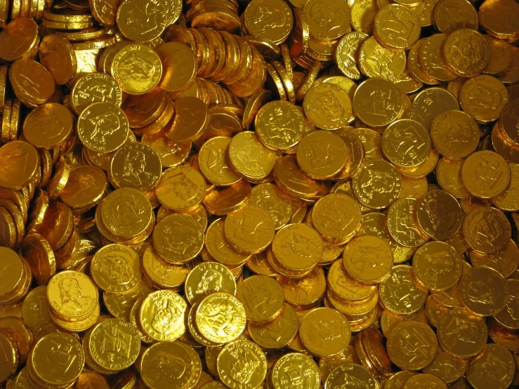 gold pennies are seen as the backdrop for a pograph