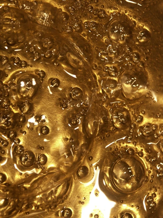 closeup view of bubbles on top of liquid