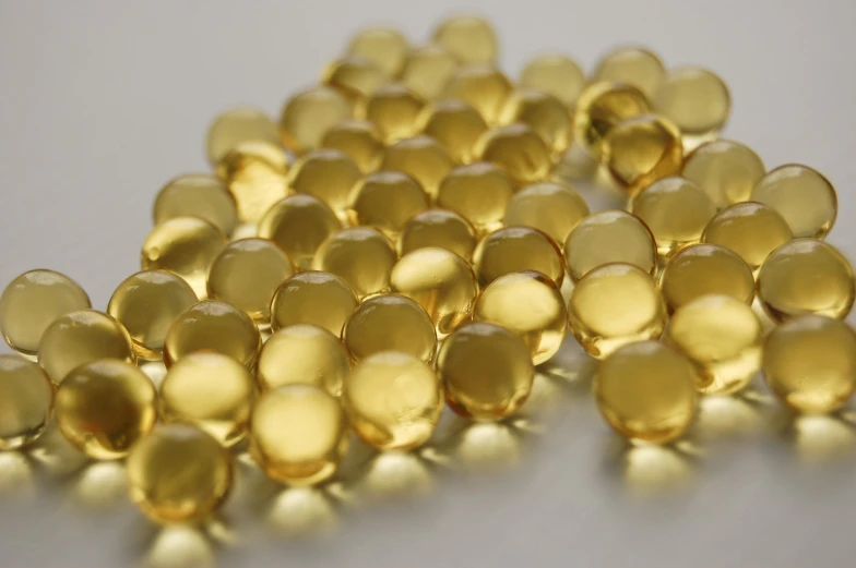 some yellow jellys laying on a white table