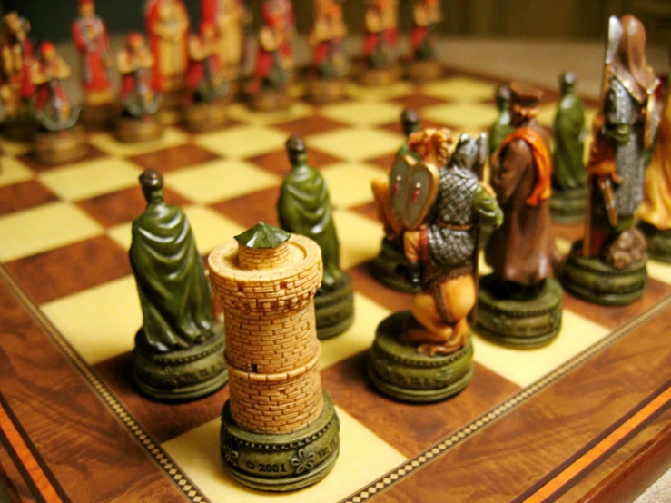 many decorative chess pieces on a chess board