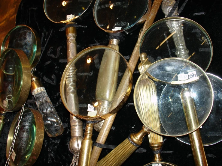 magnifying tools sit on display in an exhibit