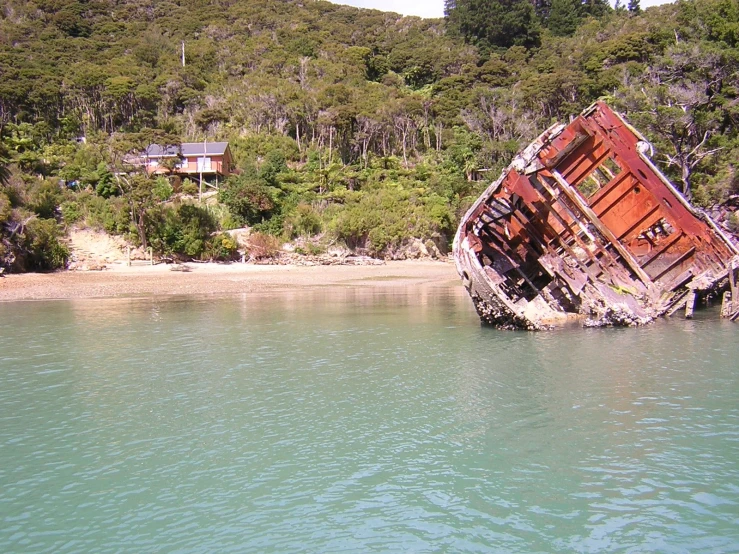 a small boat that is stuck in some water