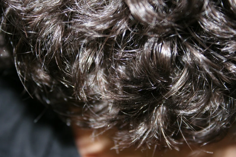 an up close view of hair with only one piece missing