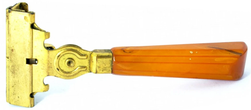 an antique door handle has been carved to look like an old fashioned sword