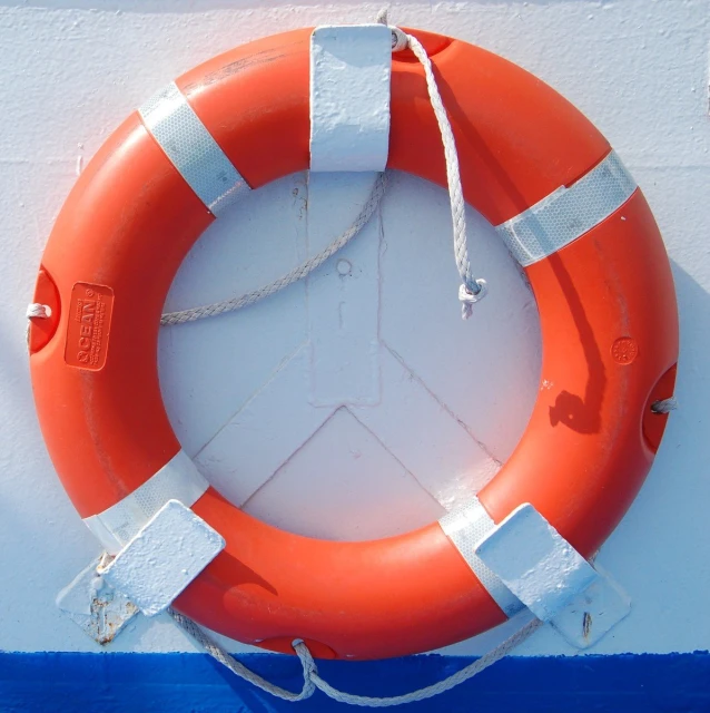 a life preserver hanging on the side of a boat