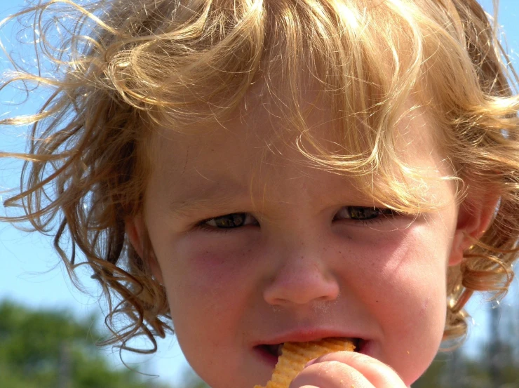 a little  that is eating some food